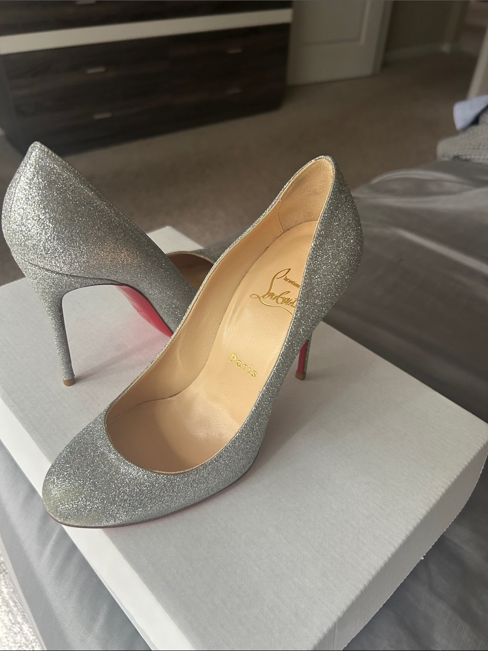 Christian Louboutin Silver Glitter Pointed Toe Pumps with Red Soles